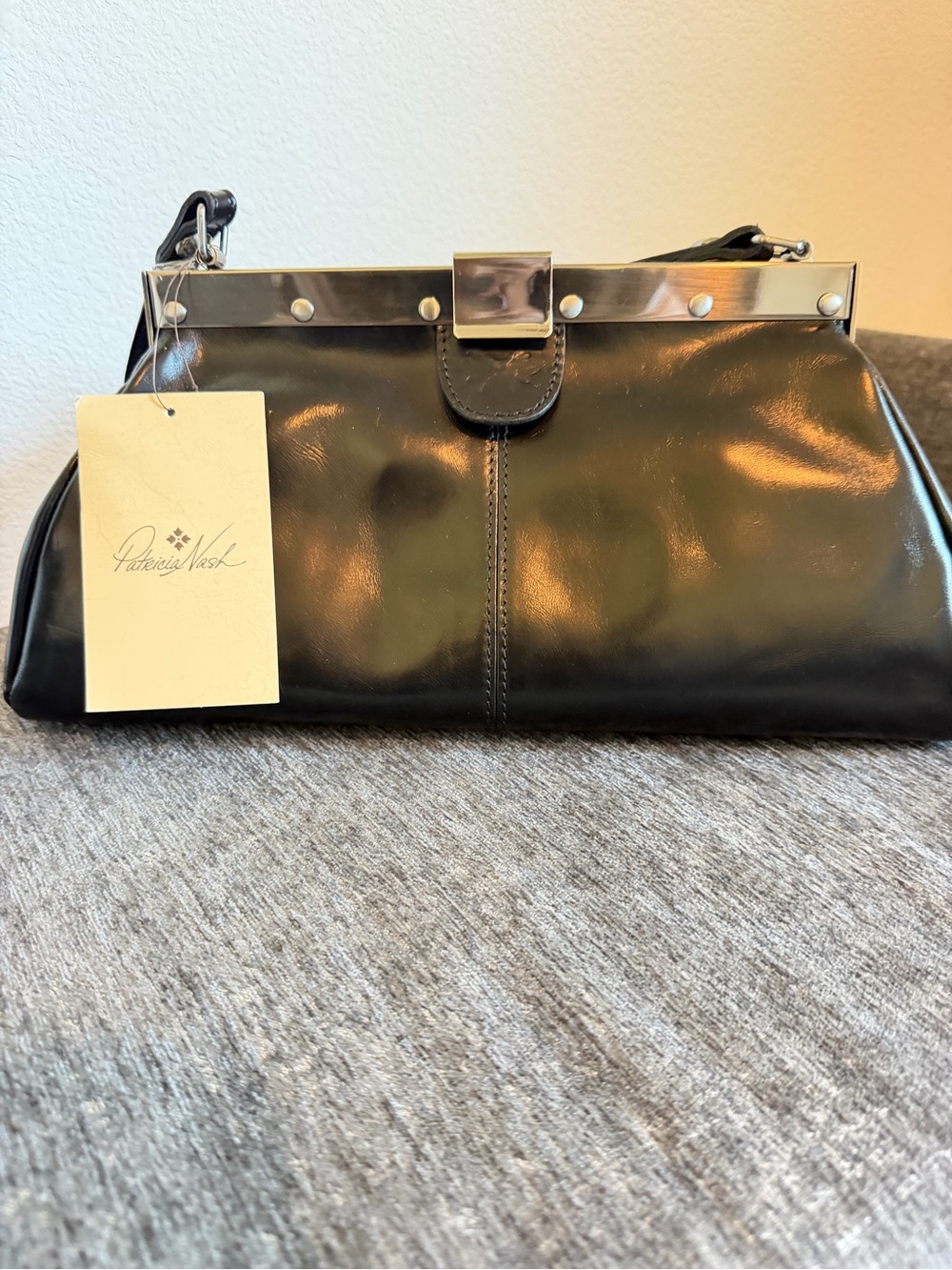 Patricia Nash Black Leather Frame-Top Wristlet Clutch